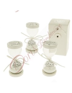 Hourglass favors with tree of life pendant and assorted writings with box measuring 11 cm
