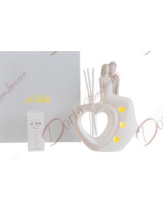 Faveurs de mariage couple marié assis sur coeur de parfum en porcelaine avec lumière led collection 2023 Les étoiles