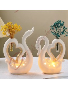 Porcelain swan wedding favors that can be used as a vase or perfumer and with LED light