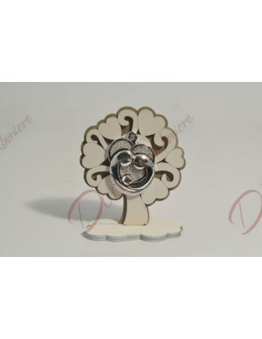 Albero della Vita in legno, con particolare Sacra Famiglia in resina argentata, h 10,5 x 8 cm Albero della Vita in legno, con particolare Sacra Famiglia in resina argentata, h 10,5 x 8 cm