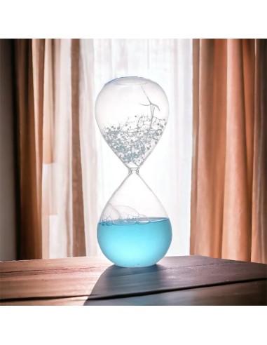 Bomboniere originali matrimonio o gadget clessidra con liquido azzurro e fiore essicato