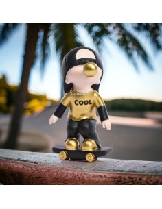 Sporty child favor on skateboard with balloon and gold and black hat 18 cm h