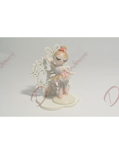 Porcelain ballerina on wooden base, 8 x 10 cm