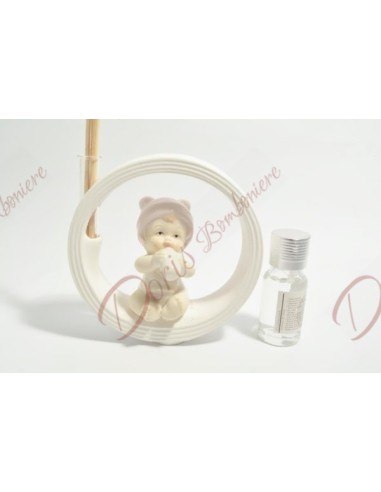 Porcelain baby girl with pink details and plaster base, complete with essence 10 x 10 x 2.5 cm
