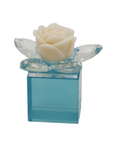 Favour: candle Prisma, with White star, with wax rose, cube, blue