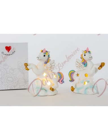 unicorn figurine in colored resin with battery led light in two assorted variants. gift box included.