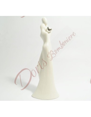 Couple statue in white porcelain with particular silver heart and silver heart on wooden base