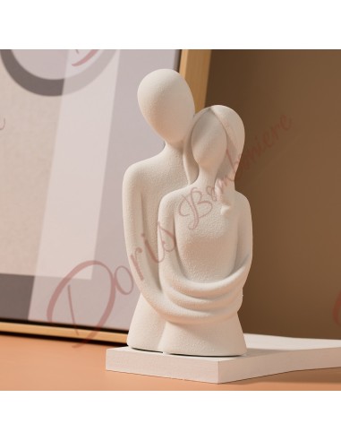 Ivory ceramic couple embrace 10x7.4x20.3 cm