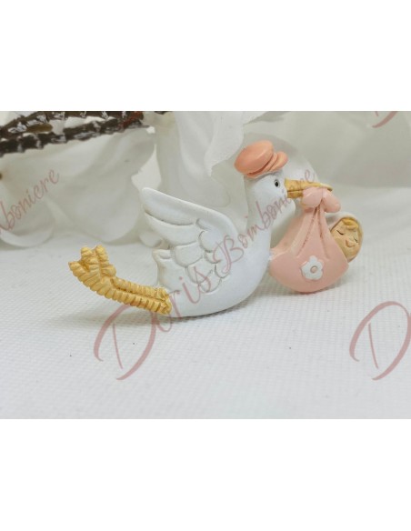 Stork magnet with pink bag 7.8 cm in resin Stork magnet with pink bag 7.8 cm in resin