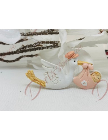 Stork magnet with pink bag 7.8 cm in resin